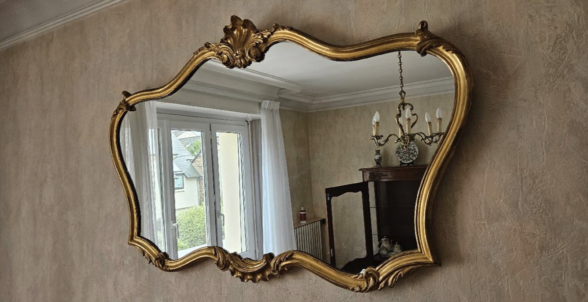 Miroir avec joli cadre